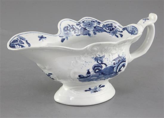 A Worcester Triangular Platform pattern blue and white sauceboat, c.1755, length 19.5cm